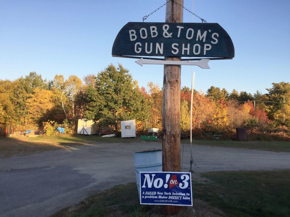 PHOTO: The sign outside Bob & Tom's gun shop in Mattawamkeag, Maine and a show of support for defeating a ballot initiative to require background checks for firearm sales in Maine, Oct. 7, 2016. (Katie Zezima/The Washington Post via Getty Images, FILE)