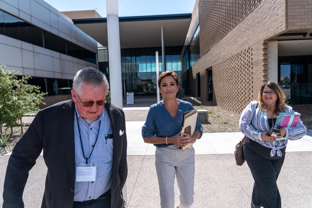 Kari Lake exits Maricopa County Superior Court after hearing closing arguments by attorneys at her election challenge trial in Mesa on May 19, 2023.