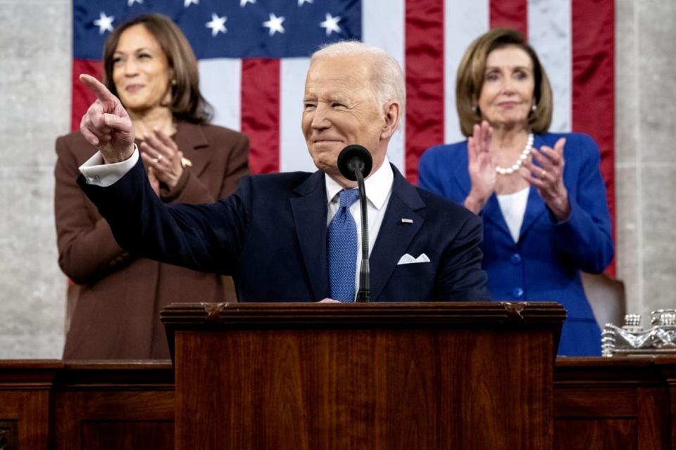 President Joe Biden delivers the State of the Union address on March 1, 2022 as U.S. Vice President Kamala Harris (left) and House Speaker Nancy Pelosi, D-Calif., look on during a joint session of Congress in the U.S. Capitol House Chamber in Washington, D.C. (Photo by Saul Loeb – Pool/Getty Images)