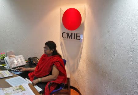 An employee works inside the office of the Centre for Monitoring Indian Economy (CMIE) in Mumbai, India, September 2, 2016. REUTERS/Shailesh Andrade