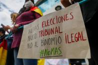 Demonstrators participate in a protest in La Paz