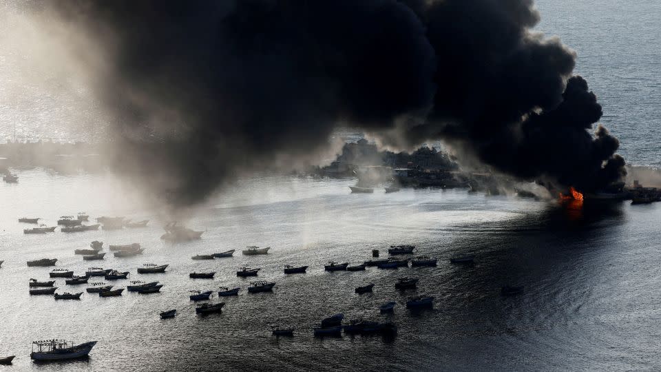 Smoke rises following Israeli strikes on the seaport of Gaza City, in Gaza on Tuesday. - Mohammed Salem/Reuters