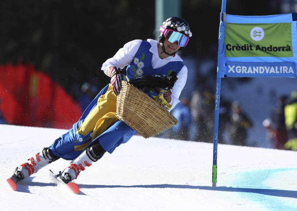 Sweden's Frida Hansdotter competes with a basket during the first run of a women's alpine ski giant slalom, in Soldeu, Andorra, Sunday, March 17, 2019. Hansdotter announced her retirement after the World Cup finals. (AP Photo/Alessandro Trovati)