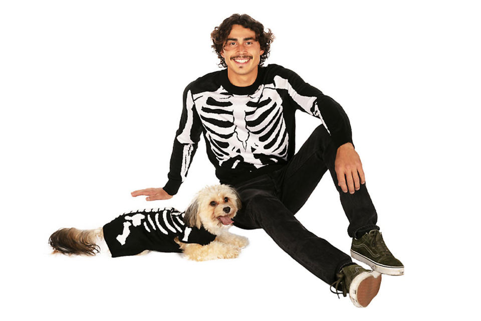 <p>This is a couple's costume that people like to see. </p> <p><strong>Buy it!</strong> Halloween Skeleton Sweater for Pups + People, $24.99; <a href="https://www.petsmart.com/dog/clothing-and-shoes/costumes/tipsy-elves-halloween-skeleton-sweater-for-pups-%2B-people-67122.html" rel="nofollow noopener" target="_blank" data-ylk="slk:PetSmart.com;elm:context_link;itc:0;sec:content-canvas" class="link ">PetSmart.com</a></p>