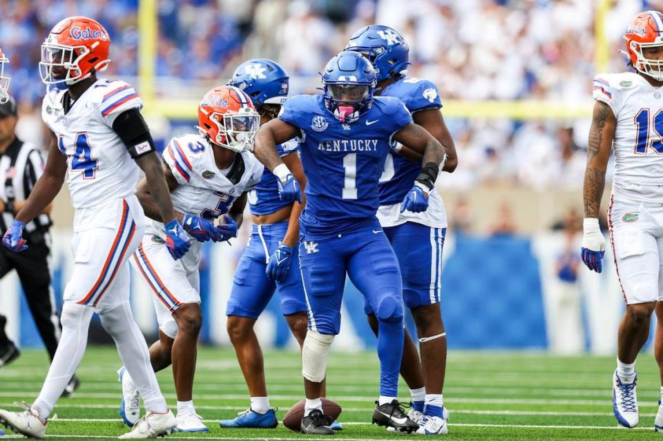 Kentucky running back Ray Davis (1) celebrates a run for a first down against Florida during Saturday’s game at Kroger Field. Silas Walker/swalker@herald-leader.com