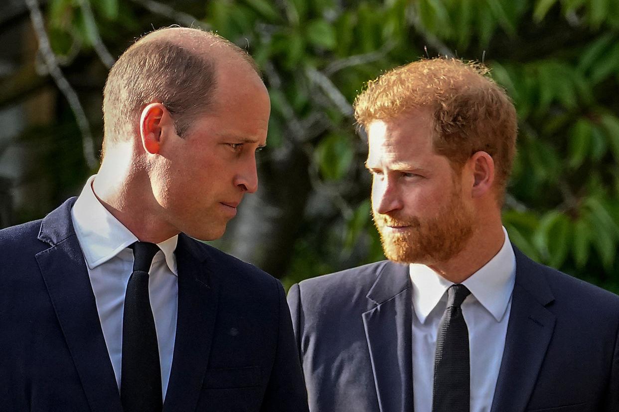 FILE - Britain's Prince William and Britain's Prince Harry walk beside each other after viewing the floral tributes for the late Queen Elizabeth II outside Windsor Castle, in Windsor, England on Sept. 10, 2022. Prince Harry flew more than 5,000 miles to see his father after King Charles III was diagnosed with cancer. But he did not see his estranged brother, William, during a visit that lasted scarcely 24 hours. William, meanwhile, returned to public duties for the first time since his wife, Kate, was admitted to a London hospital Jan. 16 for abdominal surgery. (AP Photo/Martin Meissner, File)