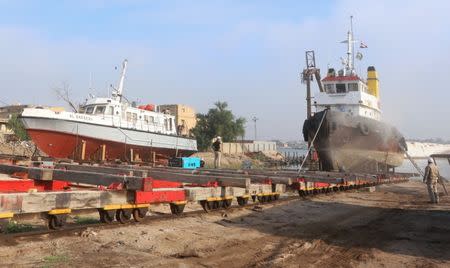 FILE PHOTO: Iraqi ships are repaired at a shipyard built by the British Army on Basra's docks in 1918, in Basra, Iraq December 23, 2018. Picture taken December 23, 2018. REUTERS/Essam al-Sudani