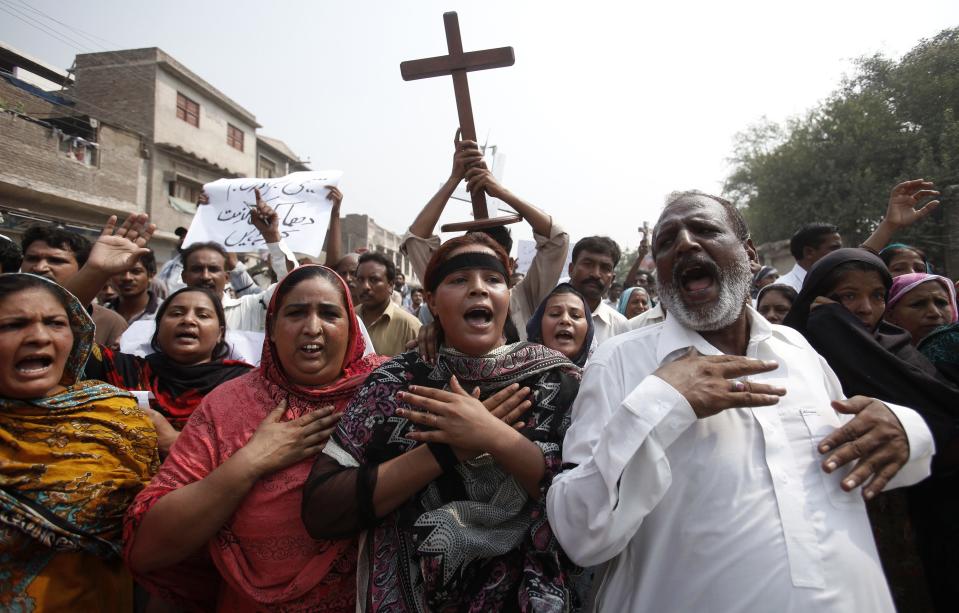 Members of the Pakistani Christian community chant slogans during a protest rally to condemn Sunday's suicide attack on a church in Peshawar September 23, 2013. A pair of suicide bombers blew themselves up outside the 130-year-old Anglican church in Pakistan after Sunday mass, killing at least 78 people in the deadliest attack on Christians in the predominantly Muslim country. (REUTERS/Fayaz Aziz)