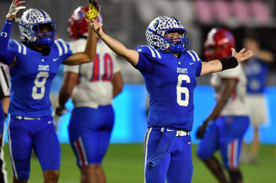 Quarterback Luke Knight (6) of Jesuit celebrates winning the Class 6A state championship game over Pine Forest at DRV PNK Stadium, Fort Lauderdale, FL  Dec. 17, 2021. 