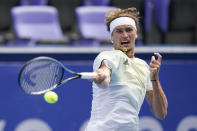 Alexander Zverev, of Germany, returns to Daniel Elahi Galan, of Colombia, during second round of the tennis competition at the 2020 Summer Olympics, Monday, July 26, 2021, in Tokyo, Japan. (AP Photo/Patrick Semansky)