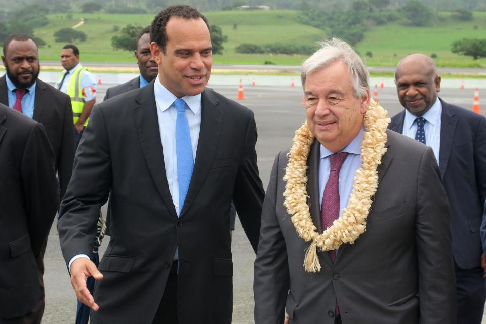 Vanuatu's Foreign Minister Ralph Regenvanu (L) welcoming United Nations Secretary General Antonio Guterres (R) on the tarmac of Port Vila's international airport, the capital of Vanuatu in May 2019.