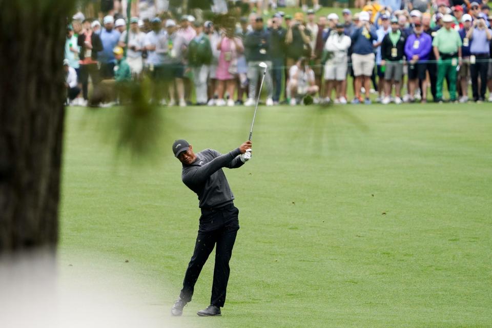 Tiger Woods plays a shot from the seventh fairway of the Augusta National Golf Club on April 9. He will make his 26th start in the Masters on Thursday.