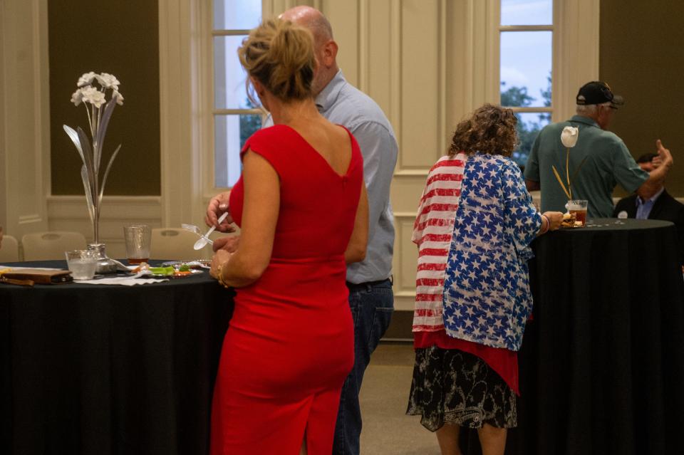 Guests mingle during a watch party for Chris McDaniel, a candidate for Mississippi Lieutenant Governor, at the Biloxi Visitor Center in Biloxi on Tuesday, Aug. 8, 2023.