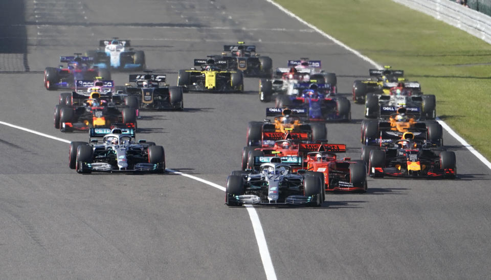 Mercedes driver Valtteri Bottas of Finland leads the field into turn one at the start of the Japanese Formula One Grand Prix at Suzuka Circuit in Suzuka, central Japan, Sunday, Oct. 13, 2019. (AP Photo/Toru Hanai)