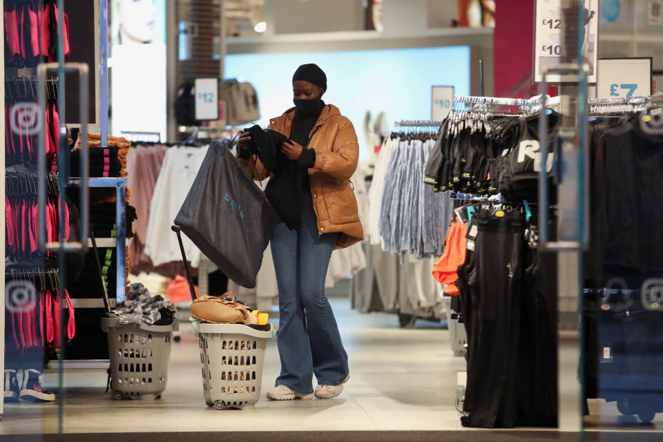 Retail sales  A customer shops inside, as retail store Primark in Birmingham, Britain reopens its doors after a third lockdown imposed in early January due to the ongoing coronavirus disease (COVID-19) pandemic, April 12, 2021. REUTERS/Carl Recine