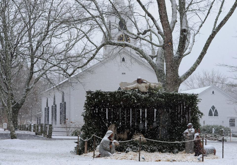 A picture postcard view of a nativity scene in front of the Dennis Union Church on a snowy afternoon, going all the way back to December of 2013 when there was a bit of snow about for a white Christmas feeling.