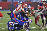 The Kansas City Chiefs defense tackles Buffalo Bills quarterback Josh Allen, center, during the first half of an NFL football game, Monday, Oct. 19, 2020, in Orchard Park, N.Y. (AP Photo/Adrian Kraus)