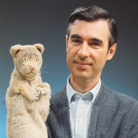 Fred Rogers. with Daniel the Tiger, in the documentary Won't You Be My Neighbor?