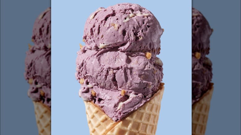 Mirror image of purple huckleberry ice cream cone