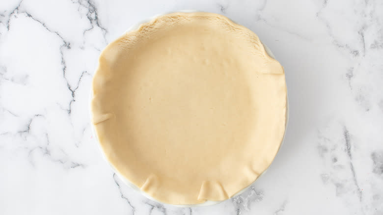 empty pie shell in dish