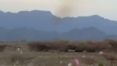 A projectile fired by the members of UAE-backed fighters, Yemeni Resistance Giants' Brigade from the back of truck is seen, near airport on the outskirts of Hodeidah, Yemen, June 19, 2018 in this still image taken from video. YEMENI RESISTANCE GIANTS' BRIGADE/REUTERS