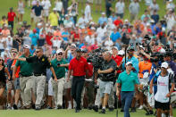 <p>ATLANTA, GA – SEPTEMBER 23: Tiger Woods is swarmed by fans as he walks to the 18th green during the final round of the TOUR Championship at East Lake Golf Club on September 23, 2018 in Atlanta, Georgia. (Photo by Tim Bradbury/Getty Images) </p>