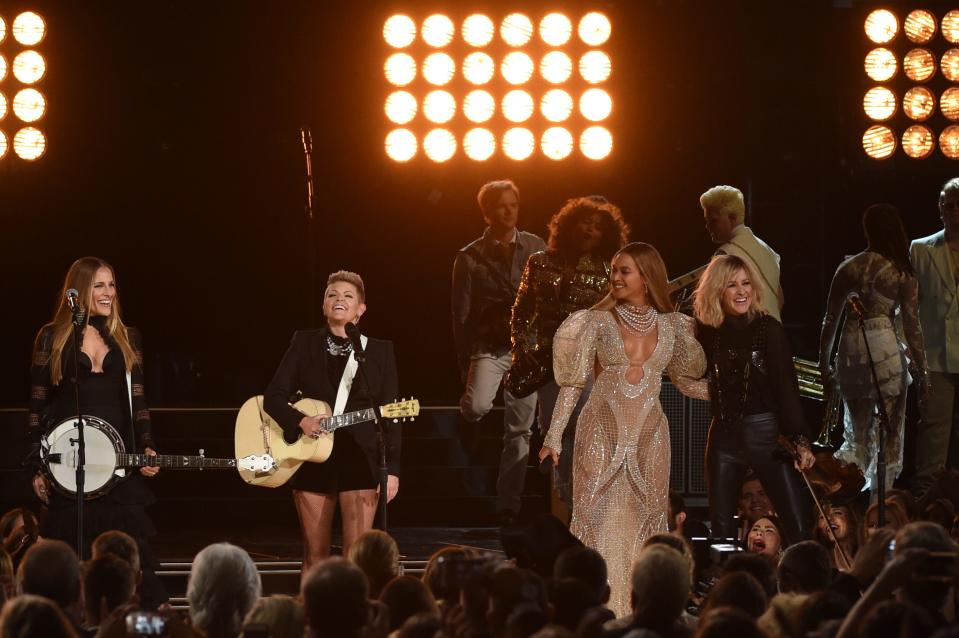 Beyonce performs onstage with Emily Robison, Natalie Maines, and Martie Maguire of The Chicks at the 50th annual CMA Awards at the Bridgestone Arena on Nov. 2, 2016.