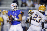 Boise State quarterback Hank Bachmeier (19) looks downfield during the first half of the team's NCAA college football game against UTEP on Friday, Sept. 10, 2021, in Boise, Idaho. (AP Photo/Steve Conner)