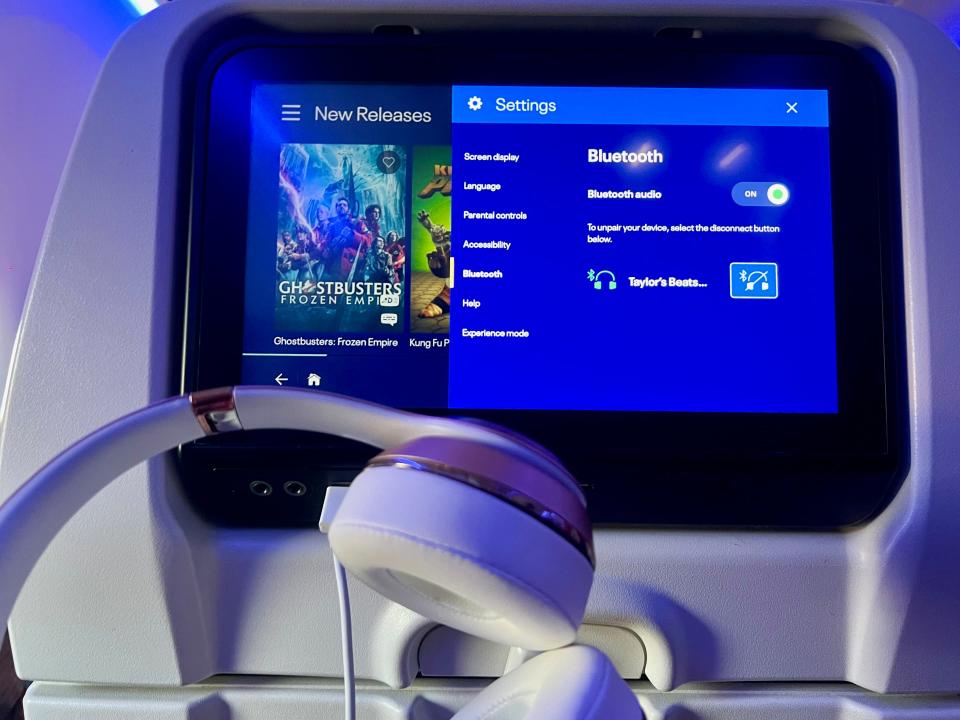 The seatback screen saying the Bluetooth connected to the author's Beats headphones.
