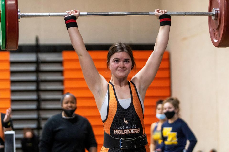 Lake Wales' Danielle Garrison completes her lift in the clean-and-jerk at last year's Polk County meet. She is looking for her third consecutive county title at Saturday's county meet.