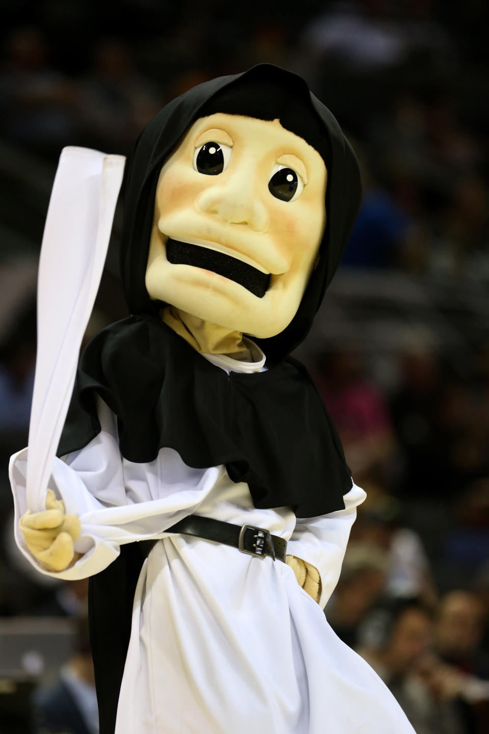 SAN ANTONIO, TX - MARCH 21: The Providence Friars mascot is shown during a timeout of the Friars game against the North Carolina Tar Heels during the second round of the 2014 NCAA Men's Basketball Tournament at AT&T Center on March 21, 2014 in San Antonio, Texas.  (Photo by Ronald Martinez/Getty Images)