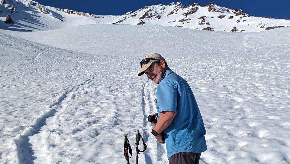 David Albert Lopez of Campell looks back at his longtime friend and mountain climbing partner Garett McDermid of Sacramento. McDermid took the photo of the 49-year-old at Avalanche Gulch on Mt. Shasta, less than an hour before Lopez died from a heart attack.