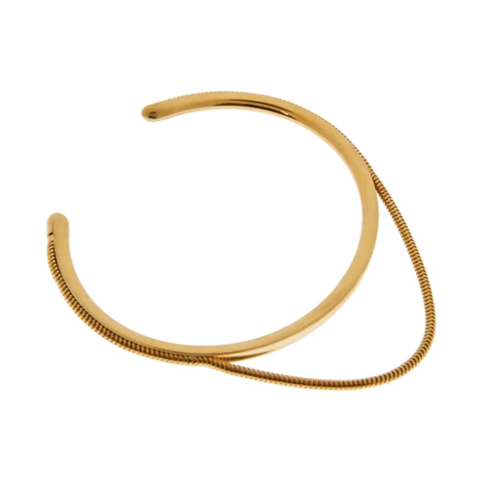 <p><a href="https://brokenenglishjewelry.com/products/mago-halo-arm-cuff?variant=40780274368686" rel="nofollow noopener" target="_blank" data-ylk="slk:Shop Now;elm:context_link;itc:0;sec:content-canvas" class="link ">Shop Now</a></p><p>Maggosh Halo Arm Cuff</p><p>brokenenglishjewelry.com</p><p>$380.00</p>