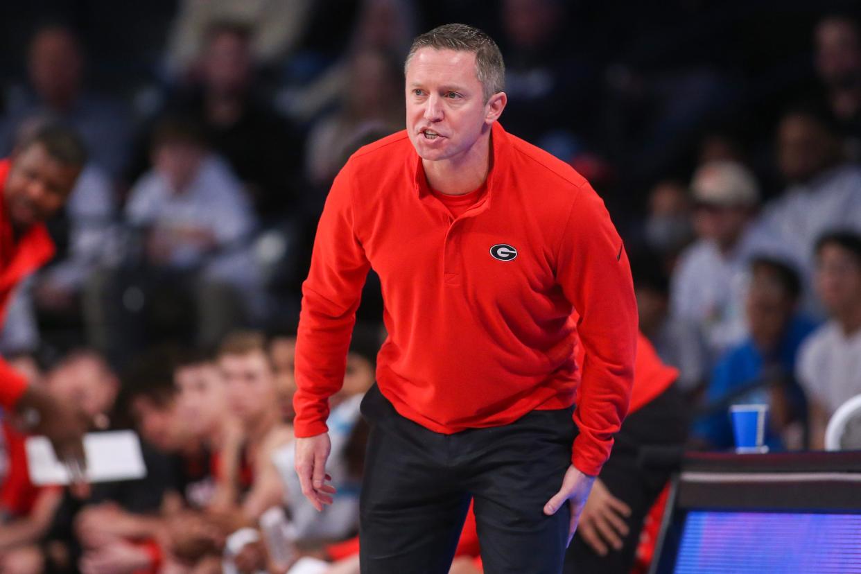 Dec 6, 2022; Atlanta, Georgia, USA; Georgia Bulldogs head coach Mike White on the bench against the Georgia Tech Yellow Jackets in the first half at McCamish Pavilion.  Brett Davis-USA TODAY Sports