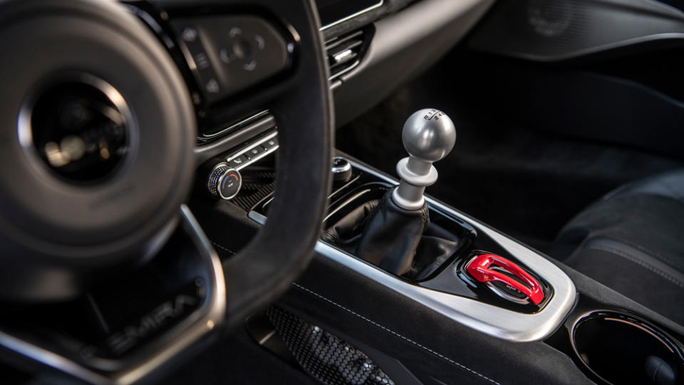 A close-up of the interior of a 2024 Lotus Emira, which comes with a six-speed manual transmission.