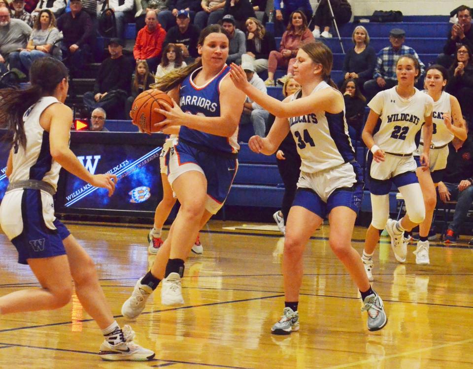 Boonsboro's Haylee Hartman drives to the basket against Williamsport.