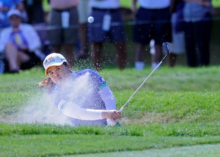 Inbee Park hits a shot out of a sand trap off the 3rd hole during the final round of the Wegman's Championship golf tournament at Monroe Golf Club. Mark Konezny-USA TODAY Sports
