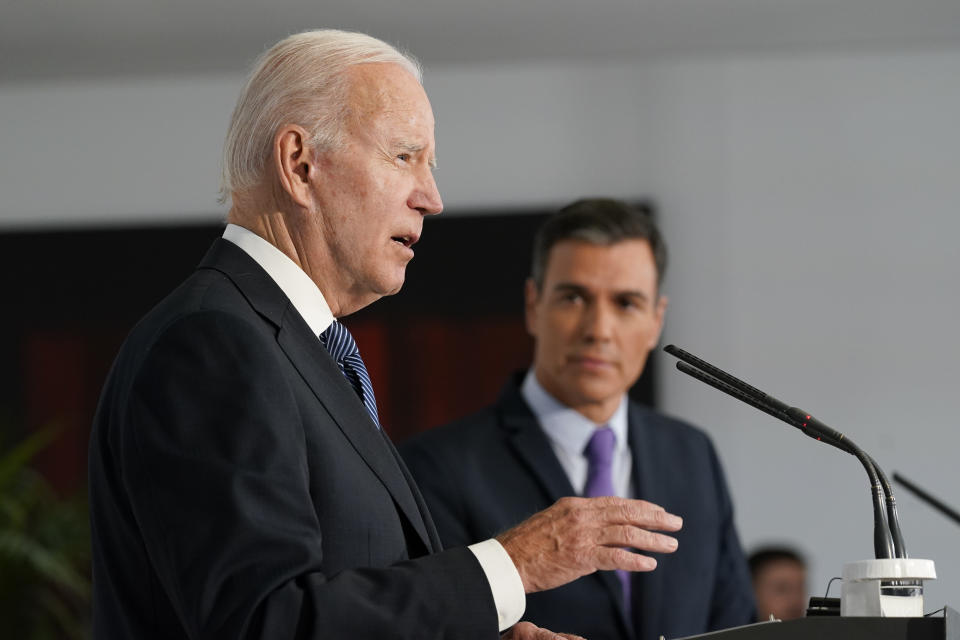 Spain's Prime Minister Pedro Sanchez listens as President Joe Biden speaks at the Palace of Moncloa in Madrid, Tuesday, June 28, 2022. Biden will also be attending the North Atlantic Treaty Organization summit in Madrid. (AP Photo/Susan Walsh)