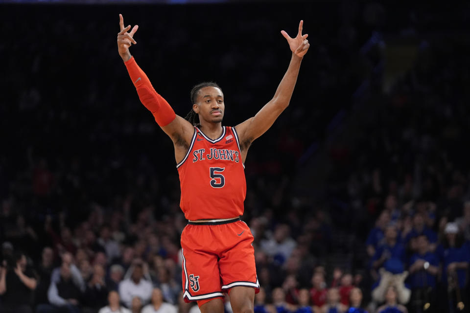 St. John's Daniss Jenkins celebrates after making a 3-point basket during the second half of an NCAA college basketball game against Seton Hall in the quarterfinal round of the Big East Conference tournament, Thursday, March 14, 2024, in New York. (AP Photo/Frank Franklin II)