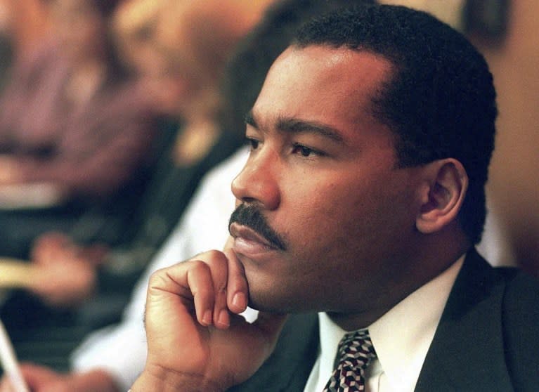 Dexter King, son of the late civil rights leader Martin Luther King Jr., listens to arguments in the State Court of Criminal Appeals in Jackson, Tenn., Friday, Aug. 29, 1997, to determine whether two Memphis judges have overstepped their authority surrounding the investigation of the King assassination. (Helen Comer/The Jackson Sun via AP, Pool, File)