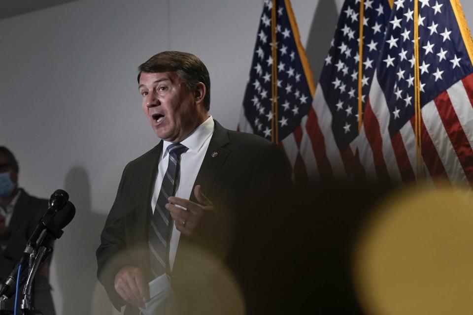 FILE - In this June 16, 2020 file photo, Sen. Mike Rounds, R-S.D., takes questions from reporters about proposed policing reforms after President Donald Trump signed an executive order on police reform on Capitol Hill in Washington, Tuesday, June 16, 2020. (AP Photo/J. Scott Applewhite, File)