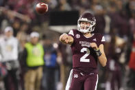 Mississippi State quarterback Will Rogers (2) passes against Mississippi during the first half of an NCAA college football game, Thursday, Nov. 25, 2021, in Starkville, Miss. (AP Photo/Rogelio V. Solis)