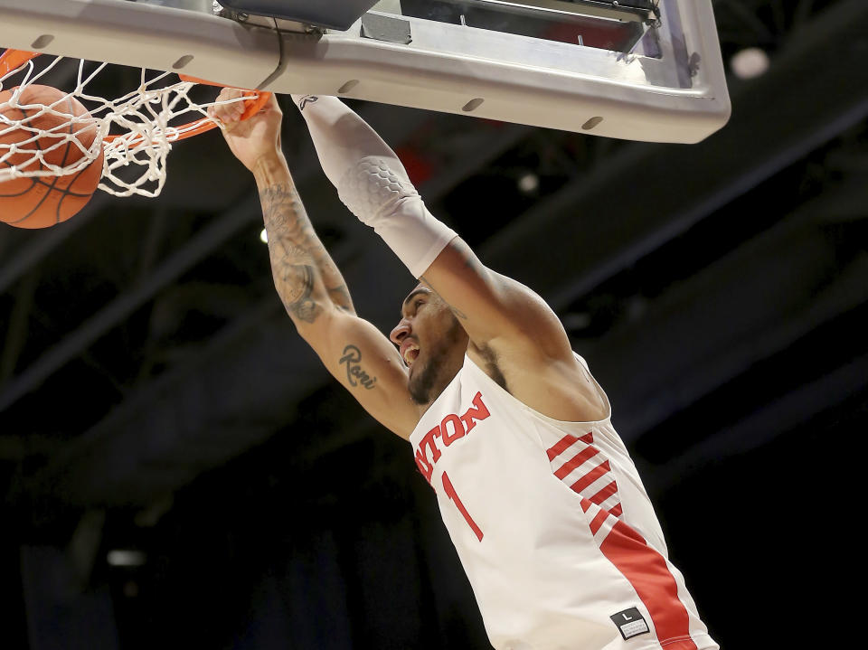 Dayton's Obi Toppin (1) dunks during the second half of an NCAA college basketball game against Fordham, Saturday, Feb. 1, 2020, in Dayton, Ohio. (AP Photo/Tony Tribble)