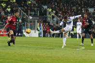 Atalanta's Alejandro Gomez, right, kicks the ball during the Italian Cup soccer match between Cagliari and Atalanta at Sardegna Arena in Cagliari, Italy, Monday, Jan. 14, 2019 (Fabio Murru/ANSA via AP)