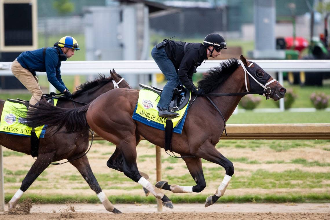 Angel of Empire, with exercise jockey Edvin Vargas, works in company with Jace’s Road, during morning training at Churchill Downs this past Saturday.