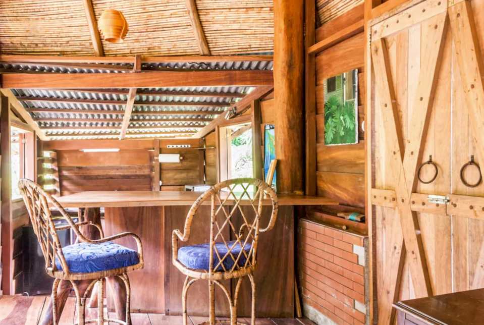 <p>The home also has a small kitchenette, with a mini-fridge, microwave oven and sink carved from wood. <br>(Airbnb) </p>