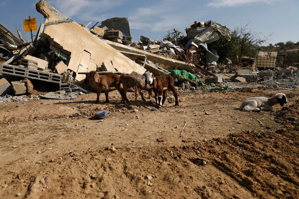 A demolished structure is seen in the southern village of Umm al-Hiran, Wednesday, Jan. 18, 2017. Israeli police say an Israeli Arab rammed his vehicle into a group of police officers, killing one of them before he was shot dead during clashes in southern Israel over a court-ordered operation to demolish illegally built homes. Local residents say police used excessive force to remove protesters, including live fire, and Amnesty International called for a probe into reports of police brutality. (AP Photo/Tsafrir Abayov)