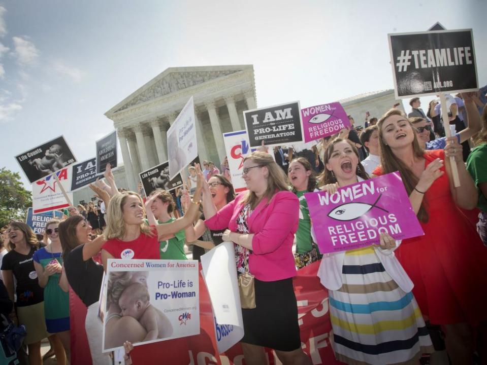 Demonstrators react to hearing the supreme court’s decision on the Hobby Lobby birth control case in 2014. ADF successfully argued the store should not be required to pay for birth control included in private insurance plans.