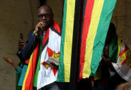 Pastor Evan Mawarire, leader of the #ThisFlag movement, addresses a prayer meeting called to celebrate after Zimbabwean President Robert Mugabe was dismissed as party leader at an extraordinary meeting of the ruling ZANU-PF's central committee in Harare, Zimbabwe, November 19, 2017. REUTERS/Philimon Bulawayo