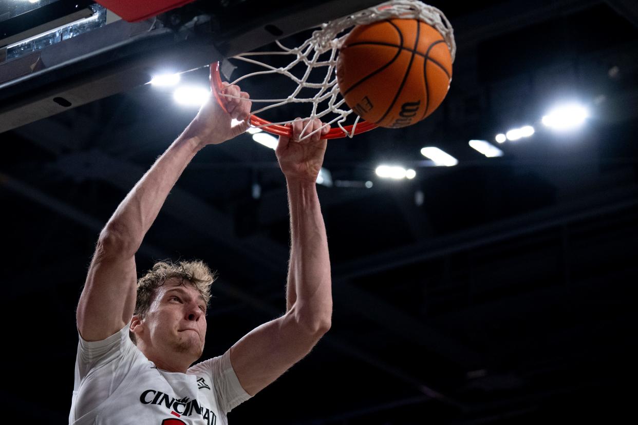 Cincinnati Bearcats forward Viktor Lakhin (30) dunks the ball vs. Stetson Dec. 22. UC could use more such moves Tuesday night when they host Texas in their home Big 12 opener.